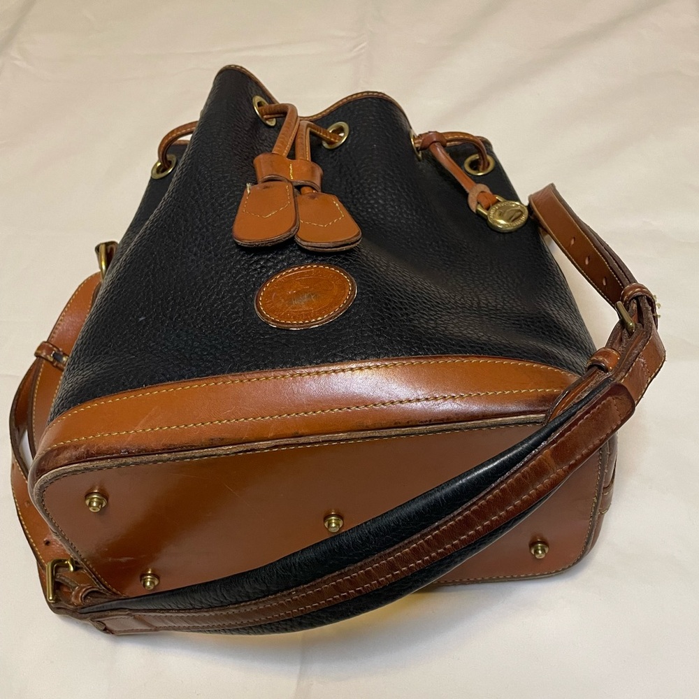 Dooney & Bourke leather drawstring, black and brown handbag - great condition!